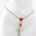 سلسلة خصر ذهبية بقلوب حمراء